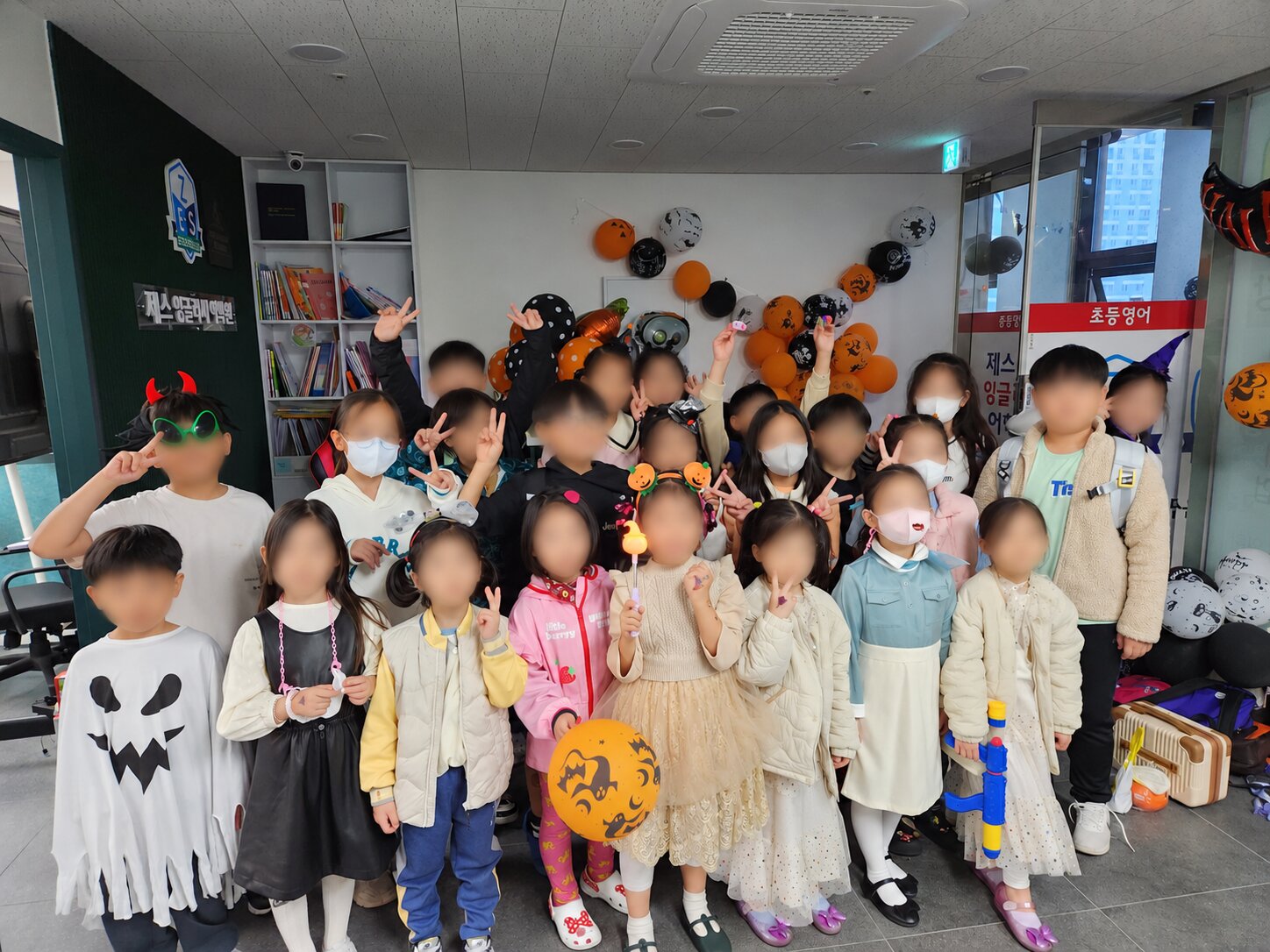 Halloween party, with children’s faces protected