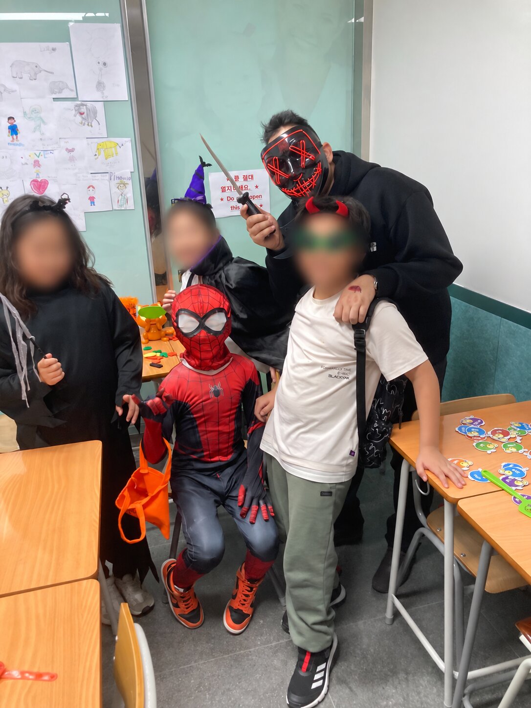 Halloween party, with children’s faces protected