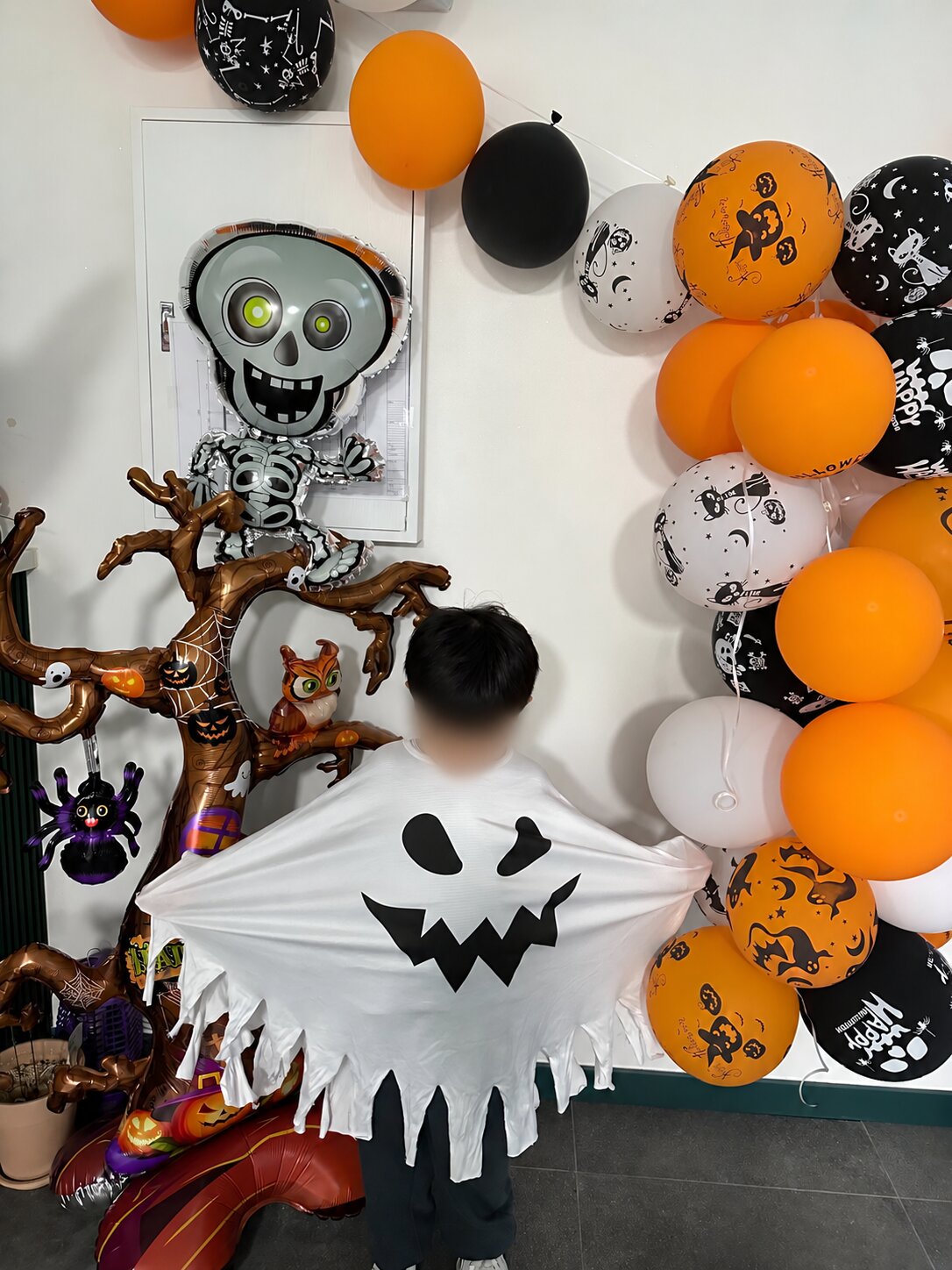 Halloween party, with children’s faces protected